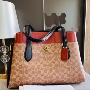 Hardly used coach Lora carryall super spacious